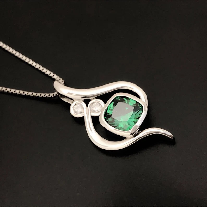 Elegant Sterling Silver Pendant with Green Gemstone