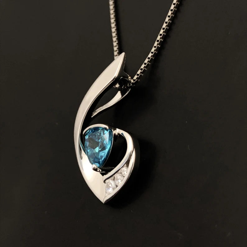 Elegant Pendant with Blue Trillion