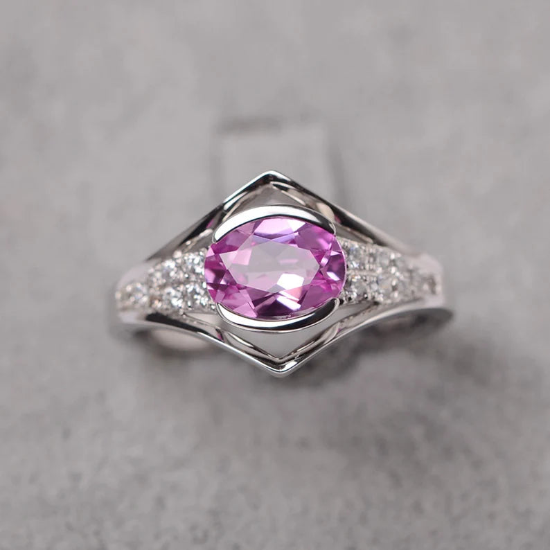 Oval-Cut Pink Gemstone Ring with Pave Accents