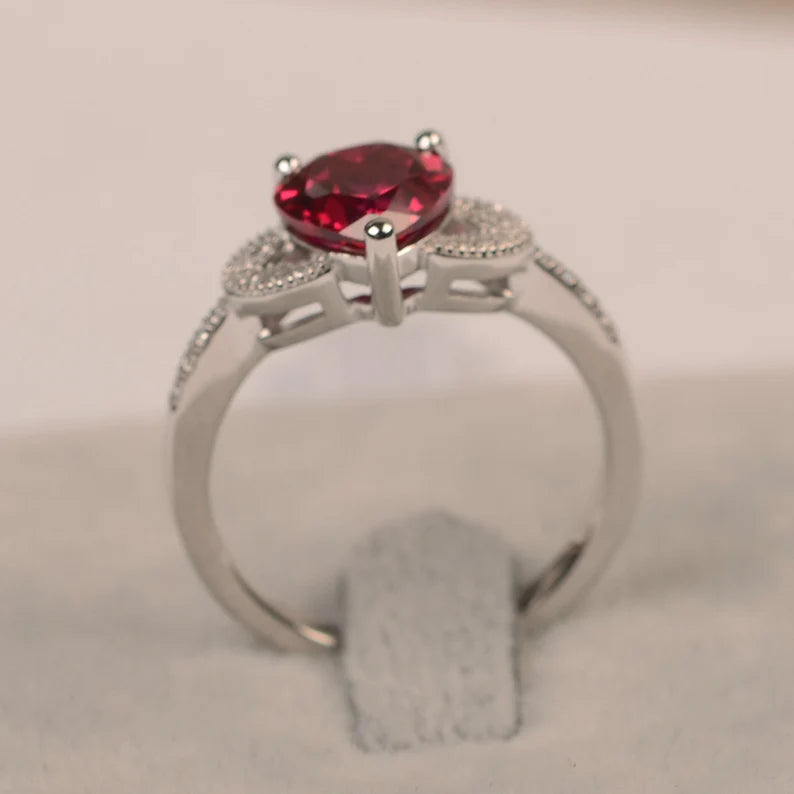 "Heart-Shaped Red Gemstone Ring with Infinity Accent