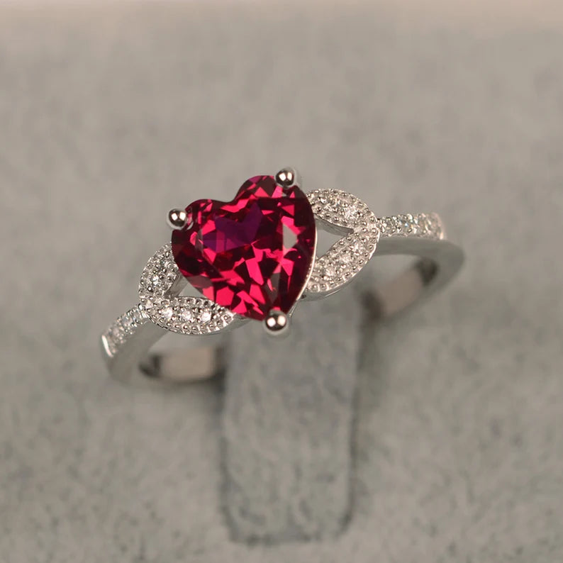 "Heart-Shaped Red Gemstone Ring with Infinity Accent