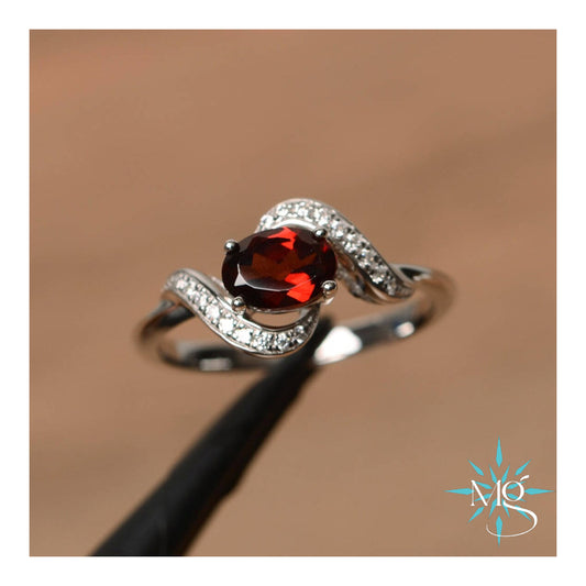 Elegant Ruby Red Twist Ring