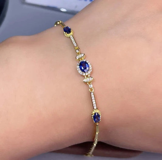 Bracelet with Blue Oval Gemstones and Halo Accents